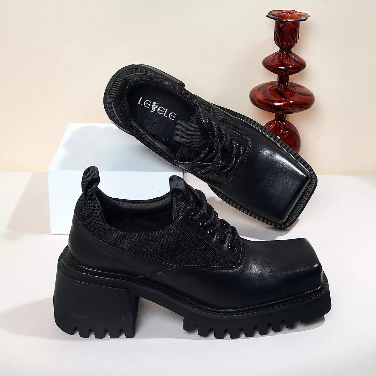 Thick soled and thick heel height increasing loafers